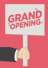 Retail Grand Opening promotion shoutout with a placard banner against a red background.