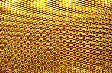 metal mesh grate gold background