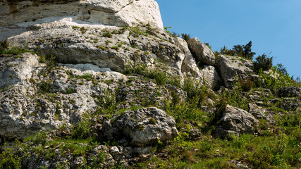 Fototapeta na wymiar View of the Sokolich Mountains Reserve and rock stones in Olsztyn. A free space for an inscription