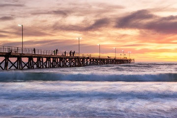 sunset over the jetty at port noarlunga south australia on 11th may 2020
