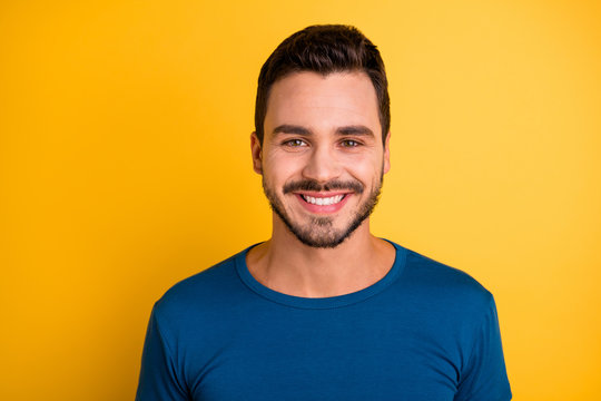 Close-up Portrait Of His He Nice Attractive Cheerful Cheery Brunette Guy Wearing Blue Tshirt Isolated Over Bright Vivid Shine Vibrant Yellow Color Background