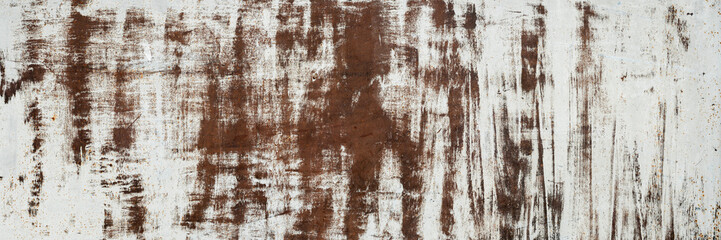 spotty wide panoramic background from a brush painted old metal surface with traces of rust