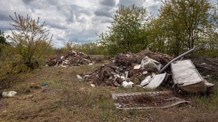 Littered meadow. No enforcement of environmental regulations