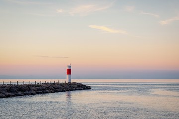 Lighthouse and beautiful sunset on lake Ontario. Rochester, USA