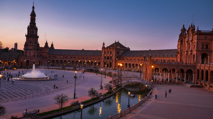 Seville, Spain - February 20th, 2020 - View of Tourists strolling in the Plaza de Espana/ Spain Square in Seville City Center.