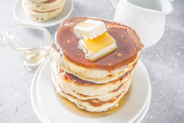 Stack of homemade pancakes. Grey stone background copy space