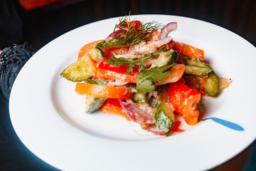 A bowl of spicy marinated vegetables snack. Healthy salad