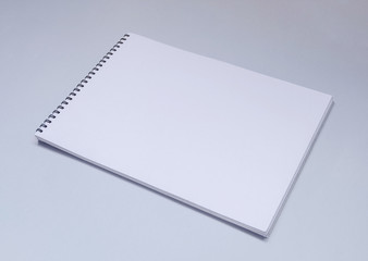 White Spiral Album or sketchbook mock up on light table