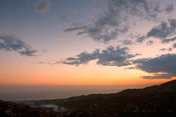Sun Setting over Torrox Costa, Costa Tropical, The Axarquia, Malaga Province, Andalucia, Spain, Western Europe.