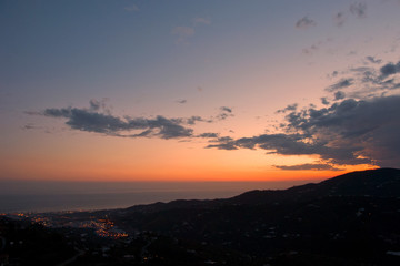 Obraz premium Sun Setting over Torrox Costa, Costa Tropical, The Axarquia, Malaga Province, Andalucia, Spain, Western Europe.