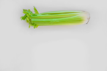 Celery stalks on a white background