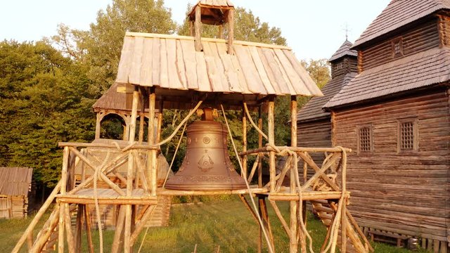 Vintage large church bell or campane. Outdoor historical museum.