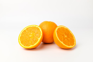 Fresh oranges on white background
