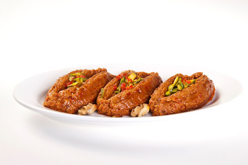 Plate of mutable on white background