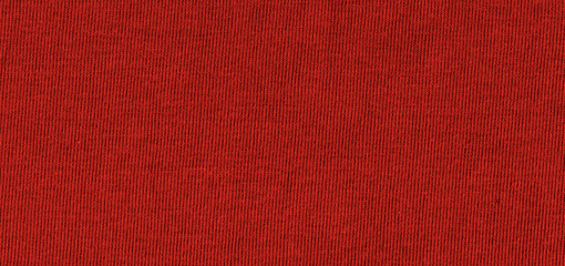 Fototapeta premium Bright red texture of knit fabric. Red textile background with natural folds. Close-up