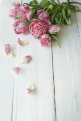on a white background a bouquet of pink flowers, a bouquet for loved ones
