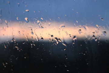 Background. Rain drops on glass.