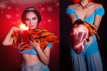 Girl posing with tiger skin and raw meat, crazy people. Don't eco friendly lifestyle. Life in...