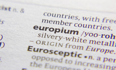 Obraz premium Europium word or phrase in a dictionary.