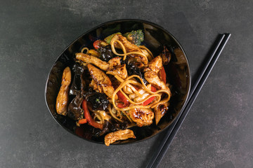 Stir fry chicken, sweet peppers. wok