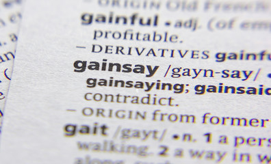 Gainsay word or phrase in a dictionary.