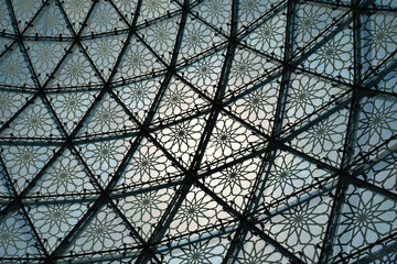 Glass roof cupola pattern formed by metal frame abstract background