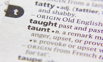 Taught word or phrase in a dictionary.