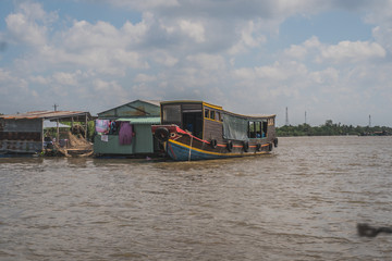 Fototapeta na wymiar Floating house on the Mekong River in Vietnam, South East Asia. Vung Tau, Vietnam
