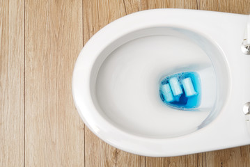 do not throw foreign objects, sanitary pads, tampons, paper, plastic into the toilet. Close-up of a...