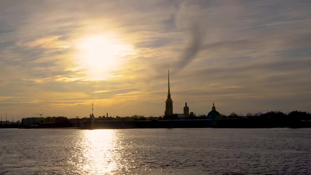 Russia, Saint Petersburg.  Peter and Paul fortress and the Neva river at sunset in Saint Petersburg. Urban landscape. Time Lapse.