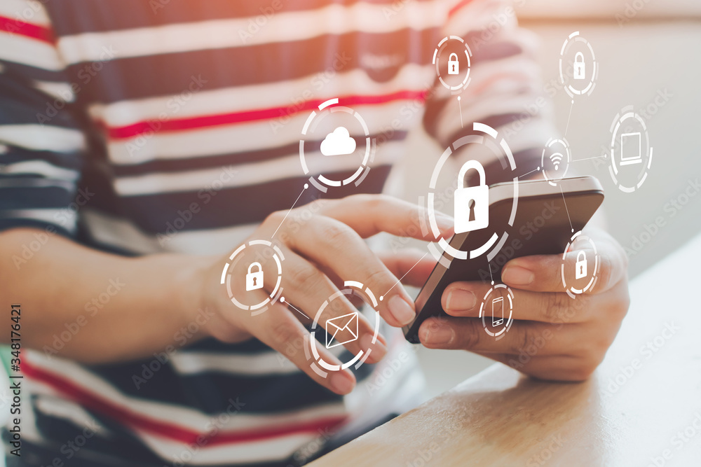 Poster close-up image of male hands using mobile smartphone with icon graphic cyber security network of con