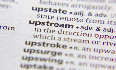 Upstream word or phrase in a dictionary.