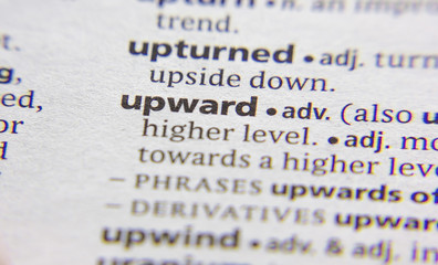 Upward word or phrase in a dictionary.