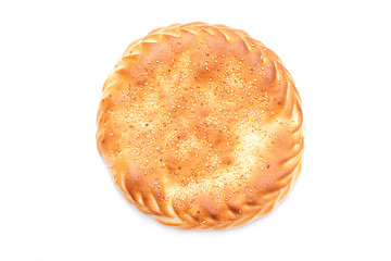 Fototapeta na wymiar Close homemade pie, top view, isolated on white background, fresh pastry with sesame