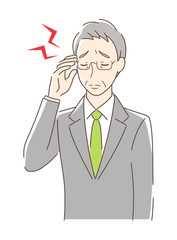 頭痛に悩む男性