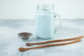 Healthy blueberry yogurt or smoothie with chia seeds. Vegetarian food, diet concept