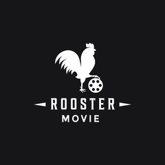 Fototapeta na wymiar creative standing rooster with movie cinema film rell