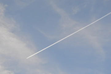airplane in the blue sky