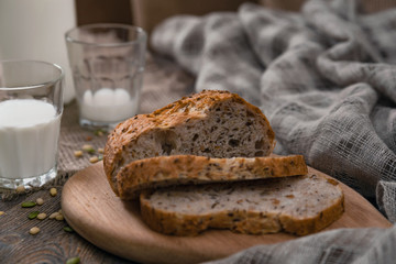 Rustic breakfast with milk and bread. World Milk Day on the first of June. Horizontal shot from above.