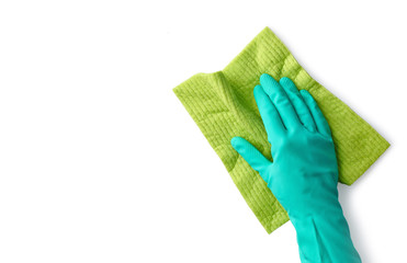 Women hand with rubber glove wiping white surface with cleaning cloth
