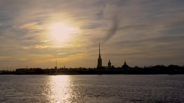 Russia, Saint Petersburg.  Peter and Paul fortress and the Neva river at sunset in Saint Petersburg. Urban landscape. Time Lapse.
