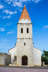 Fototapeta na wymiar The church and monastery of St Francis in Krk town on the island Krk in Croatia