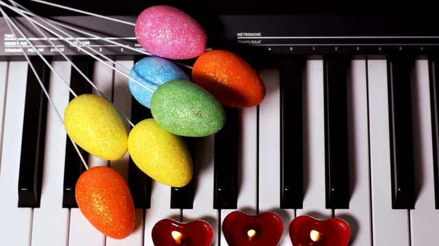 Colorful Easter Paschal Eggs on Piano Keys