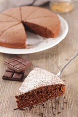 chocolate cake slice on wood background