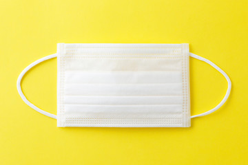 マスク　Face mask on yellow background