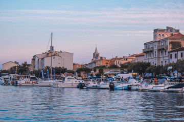 Picturesque coastal view of Rab town harbour bay. Rab island in Croatia is a popular tourist spot...
