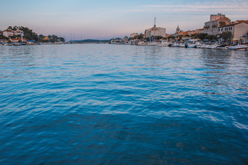 Picturesque coastal view of Rab town harbour bay. Rab island in Croatia is a popular tourist spot...