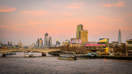 London skyline at sunset over the River Thames