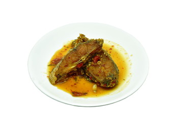 batter fried slice mango fish dressing spicy and sweet herb sauce on plate