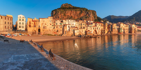 Beautiful panoramic view of coastal city Cefalu at sunset, Sicily, Italy